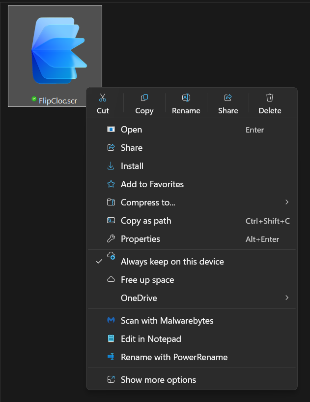 Right click FlipCloc.scr and select Install